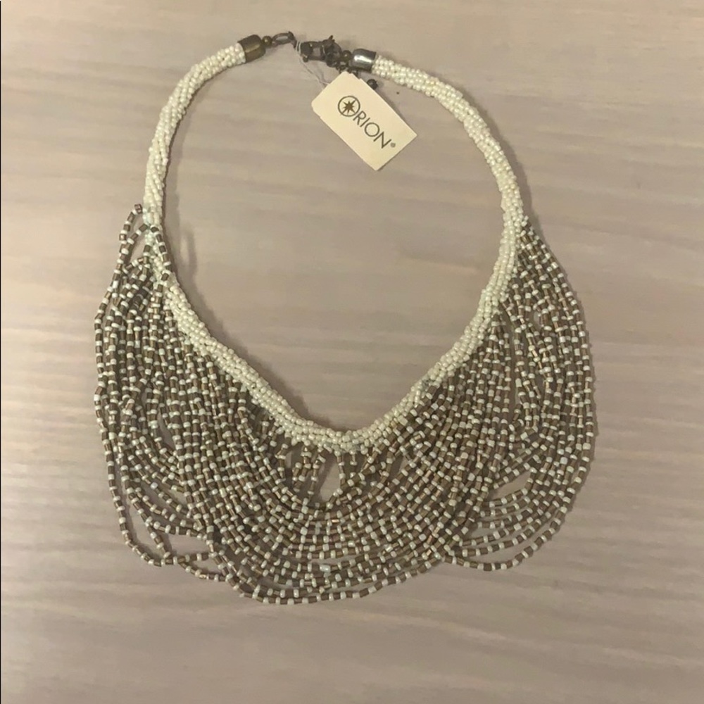 White and gold statement necklace